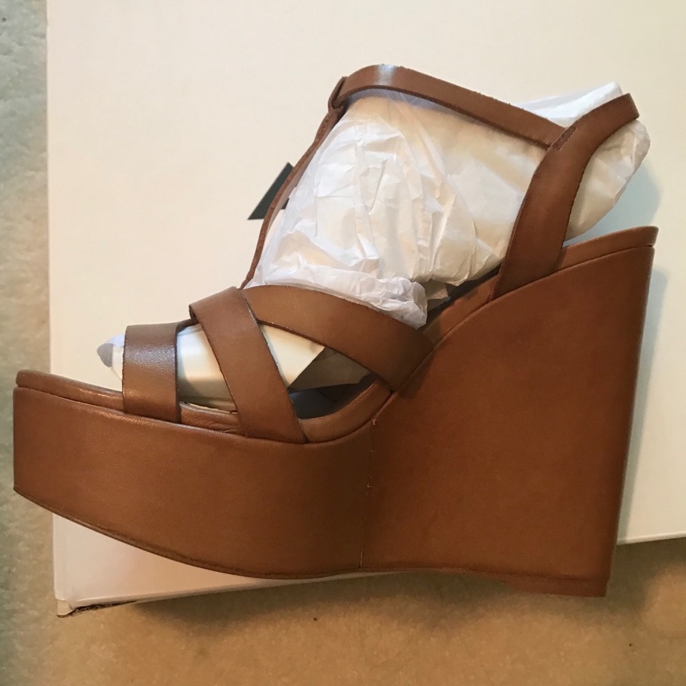 Aldo wedges. Very comfortable and stylish.